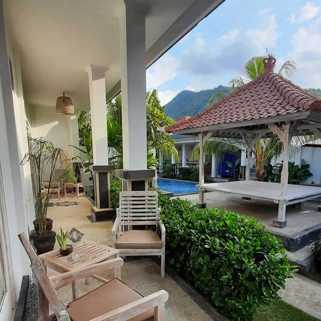 Relax in our luxurious tropical garden by the pool at Bali Diversity Dive Resort in Amed