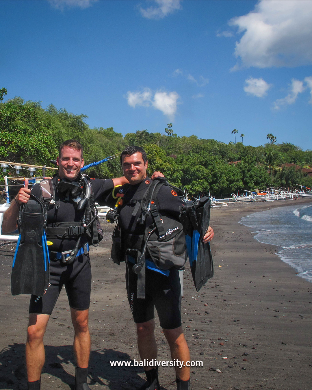 Dive buddies ready to go diving Dive buddies ready to go diving