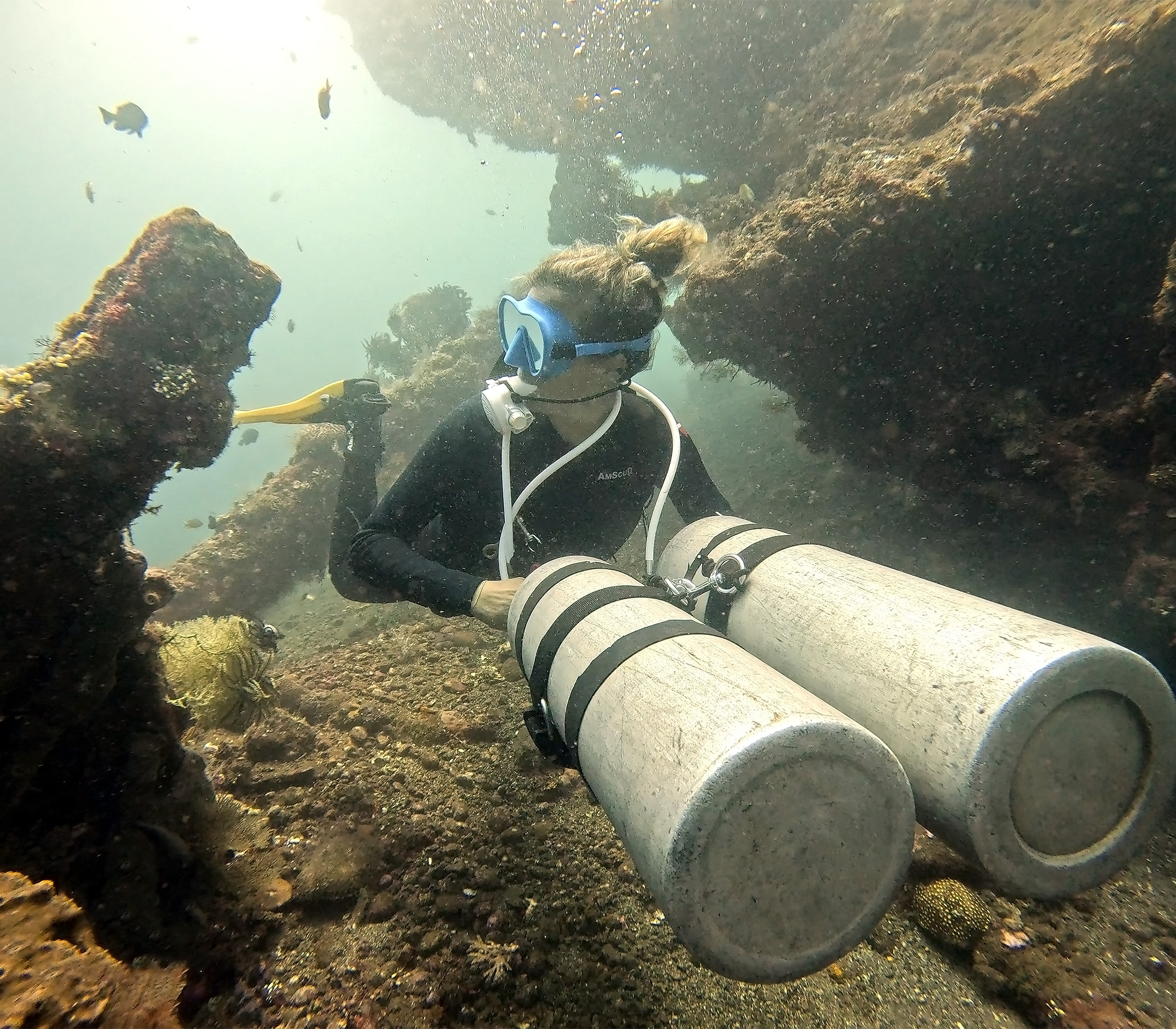 Learn to teach streamlined sidemount configuration during PADI Sidemount Instructor training at Bali Diversity.