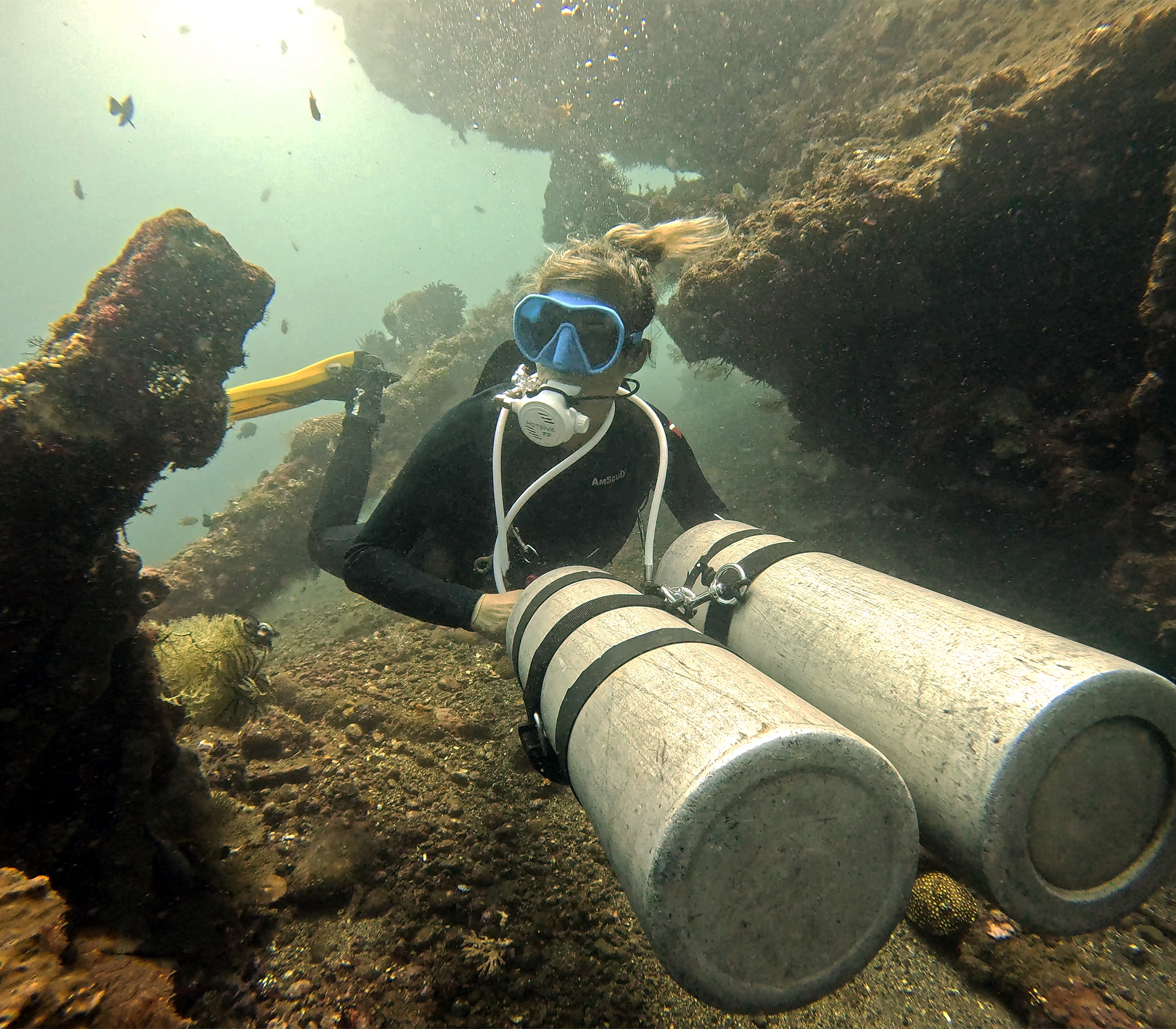 Explore streamlined sidemount diving techniques with PADI Sidemount Bali Diversity instructors.